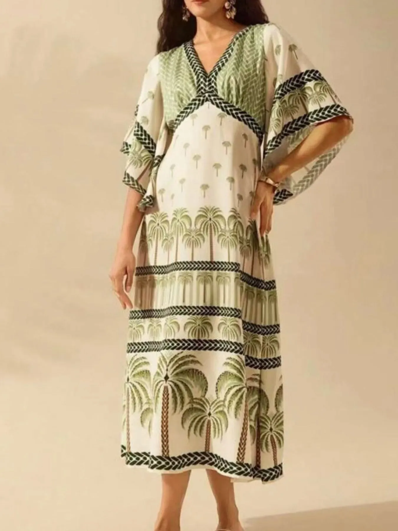 Palm Print V-Neck Midi Dress sold by Charming Charlie