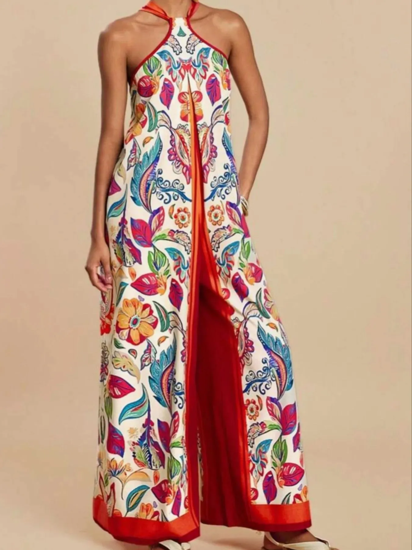 Printed Halter Wide-Leg Jumpsuit sold by Charming Charlie