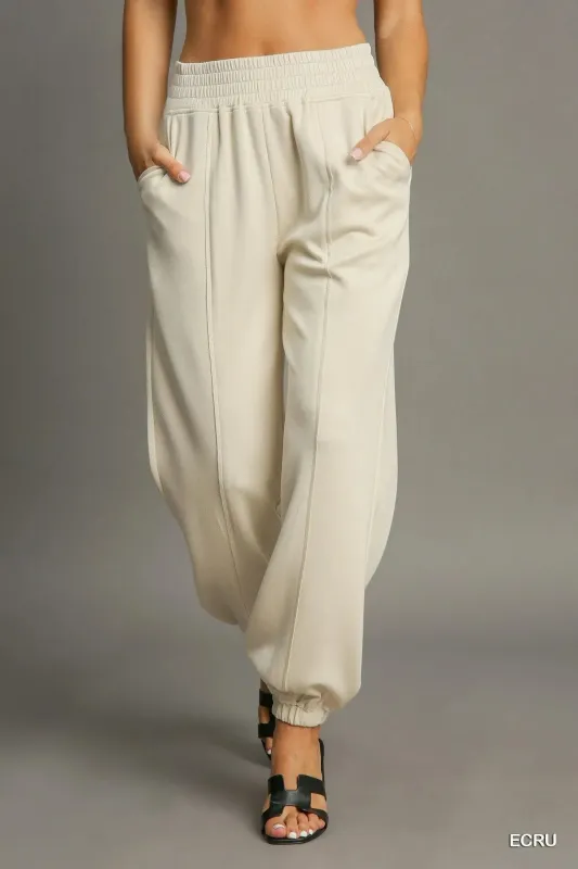 Umgee Drawstring Jogger Pants with Front Seam Detail sold by Charming Charlie