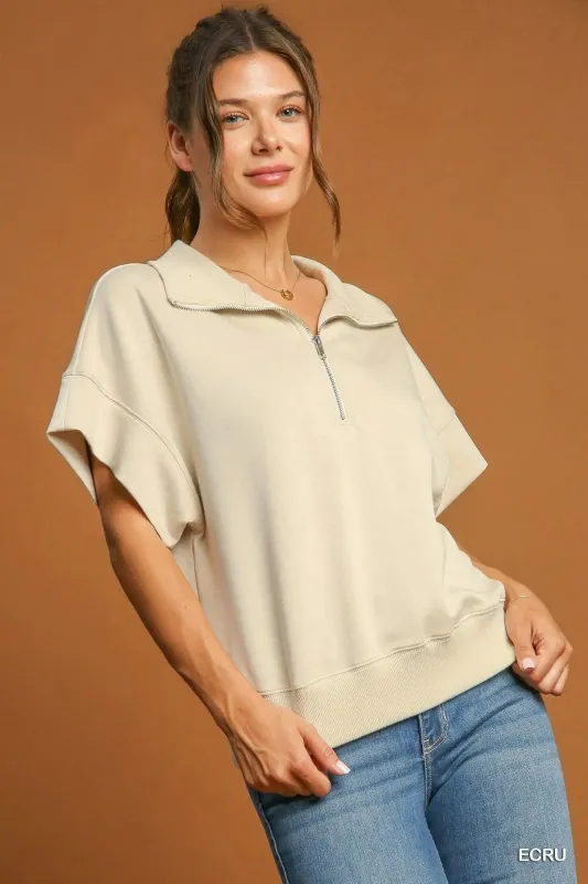 Umgee Full Size Half-Zip Short Sleeve Top Plus Size sold by Charming Charlie