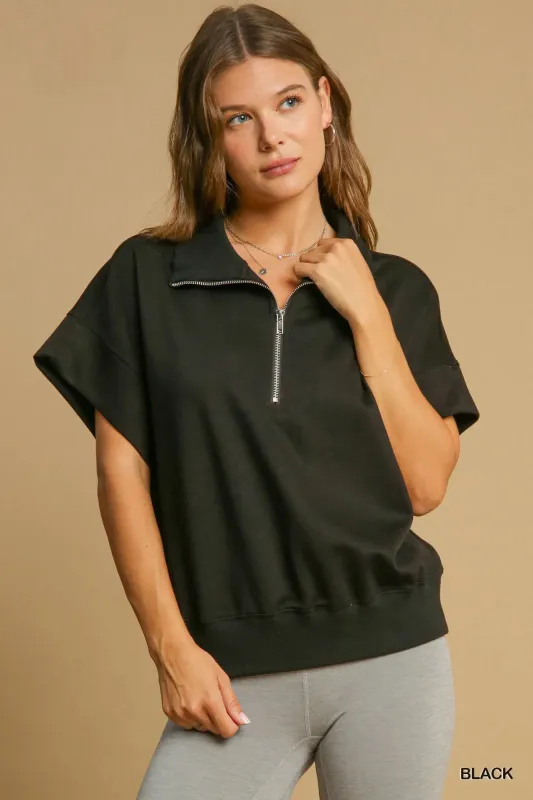 Umgee Full Size Half-Zip Short Sleeve Top Plus Size sold by Charming Charlie