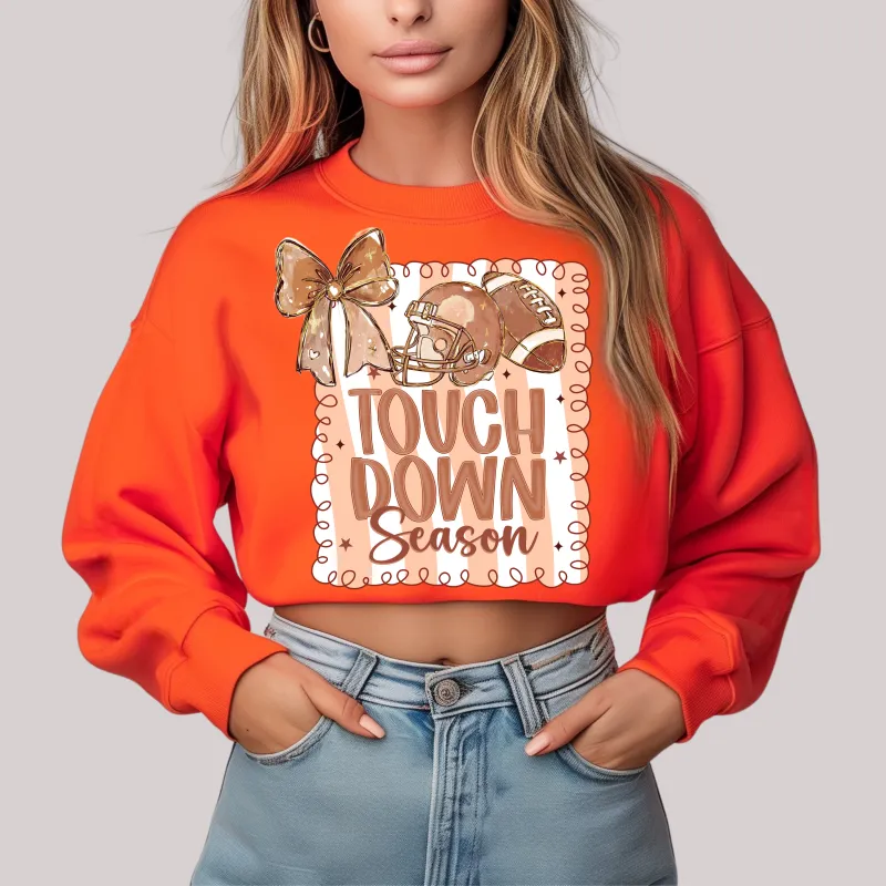 Coquette Touchdown Season in Orange Sweatshirt sold by Charming Charlie