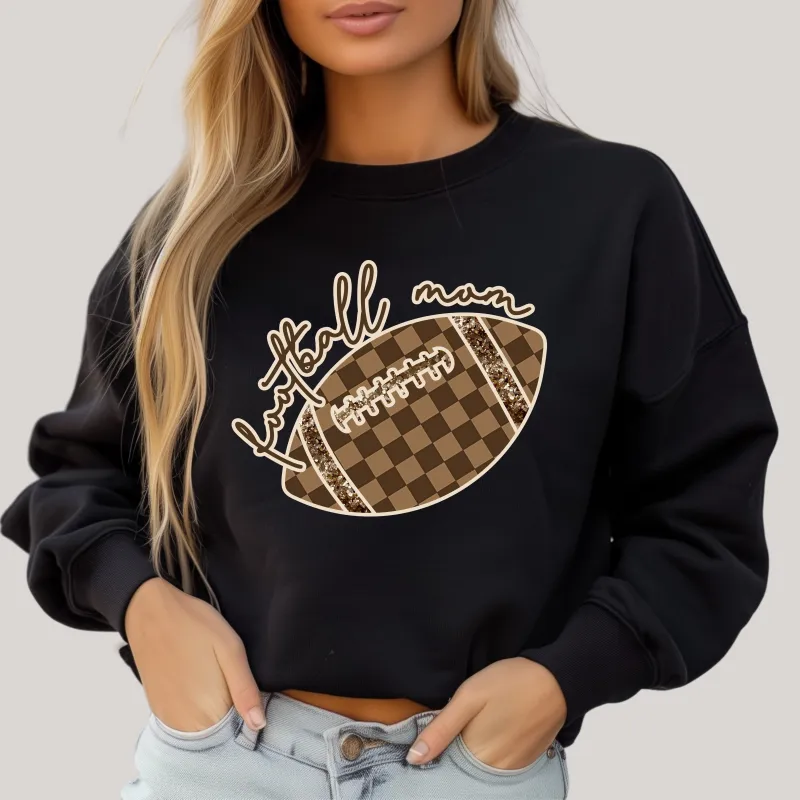 Check Football Mom in Black Sweatshirt sold by Charming Charlie