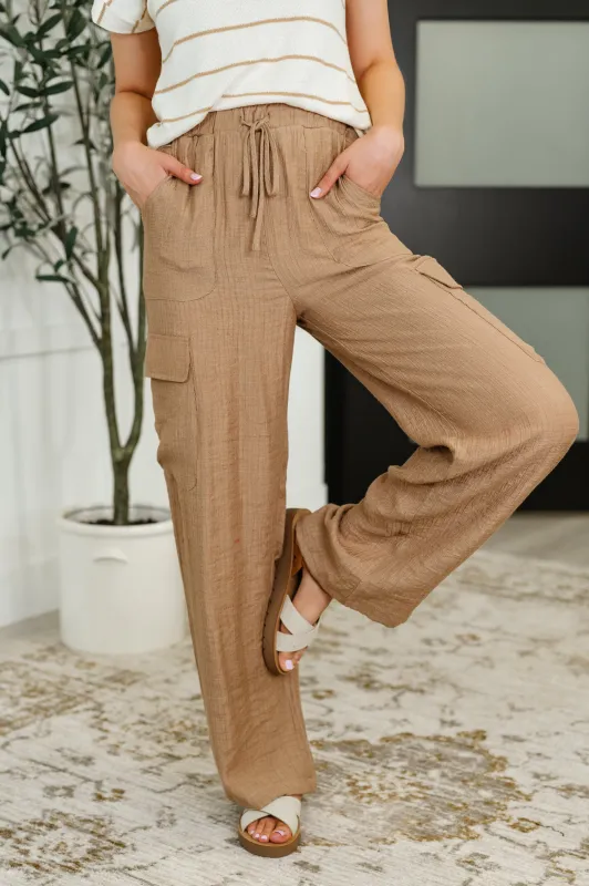 Off Duty Straight Leg Cargo Pants in Tan sold by Charming Charlie