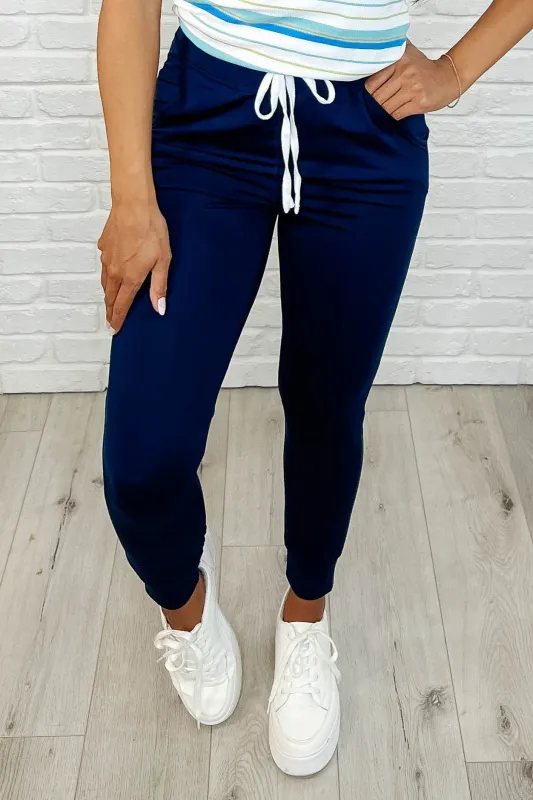 Giving the Run Around Joggers in Navy sold by Charming Charlie