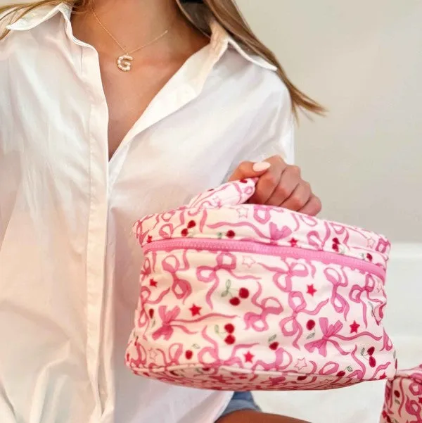 Cherry Bowtiful Travel Cosmetic Case With Handle sold by Charming Charlie
