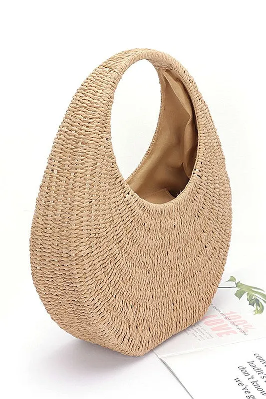 Faux Straw Wicker Moon Bag sold by Charming Charlie