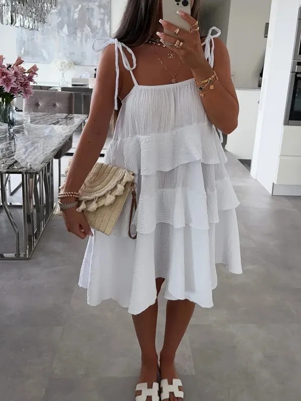 Ruffled Tie Shoulder Mini Dress sold by Charming Charlie