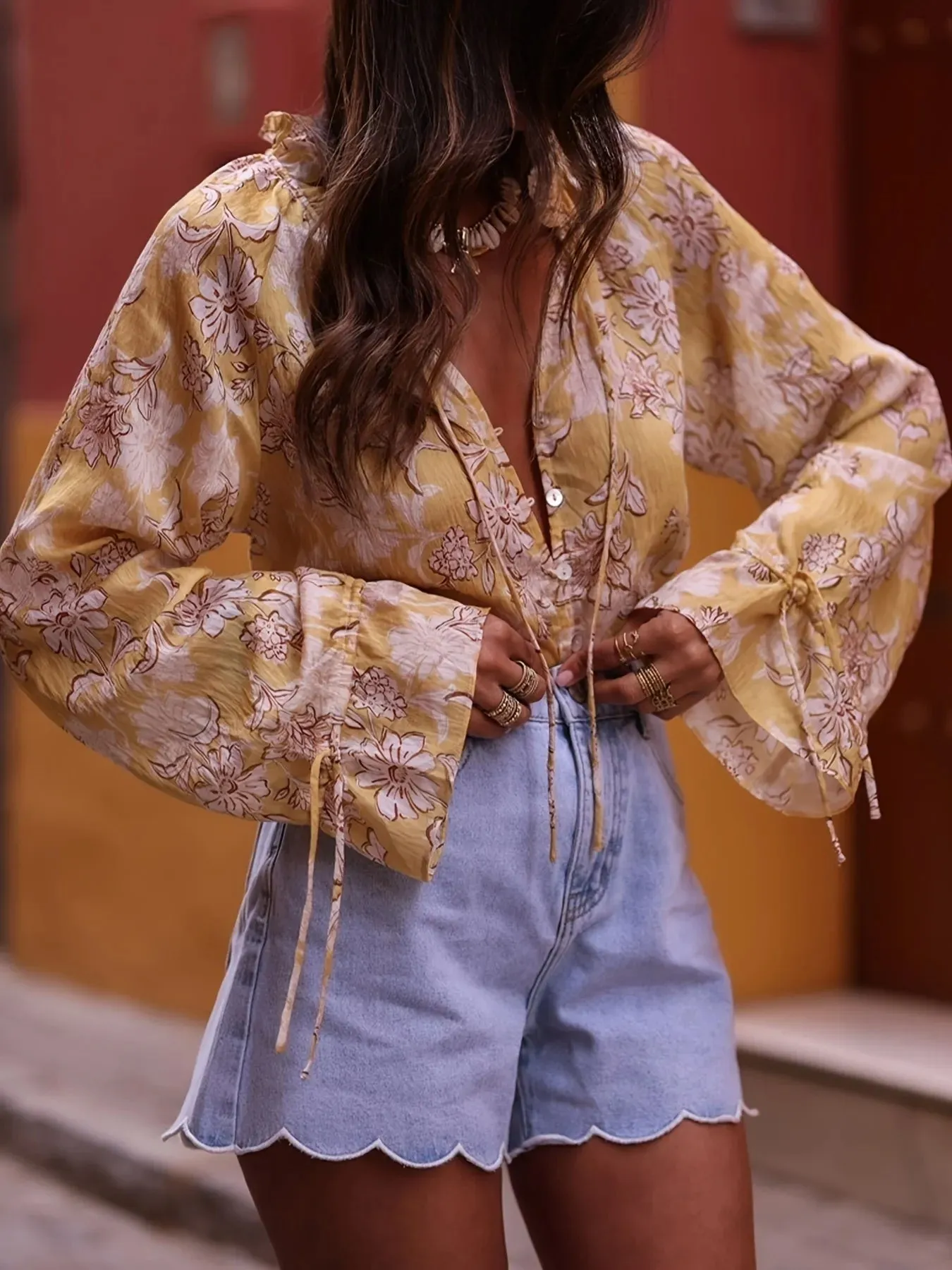 Printed Tie Neck Flounce Sleeve Blouse sold by Charming Charlie