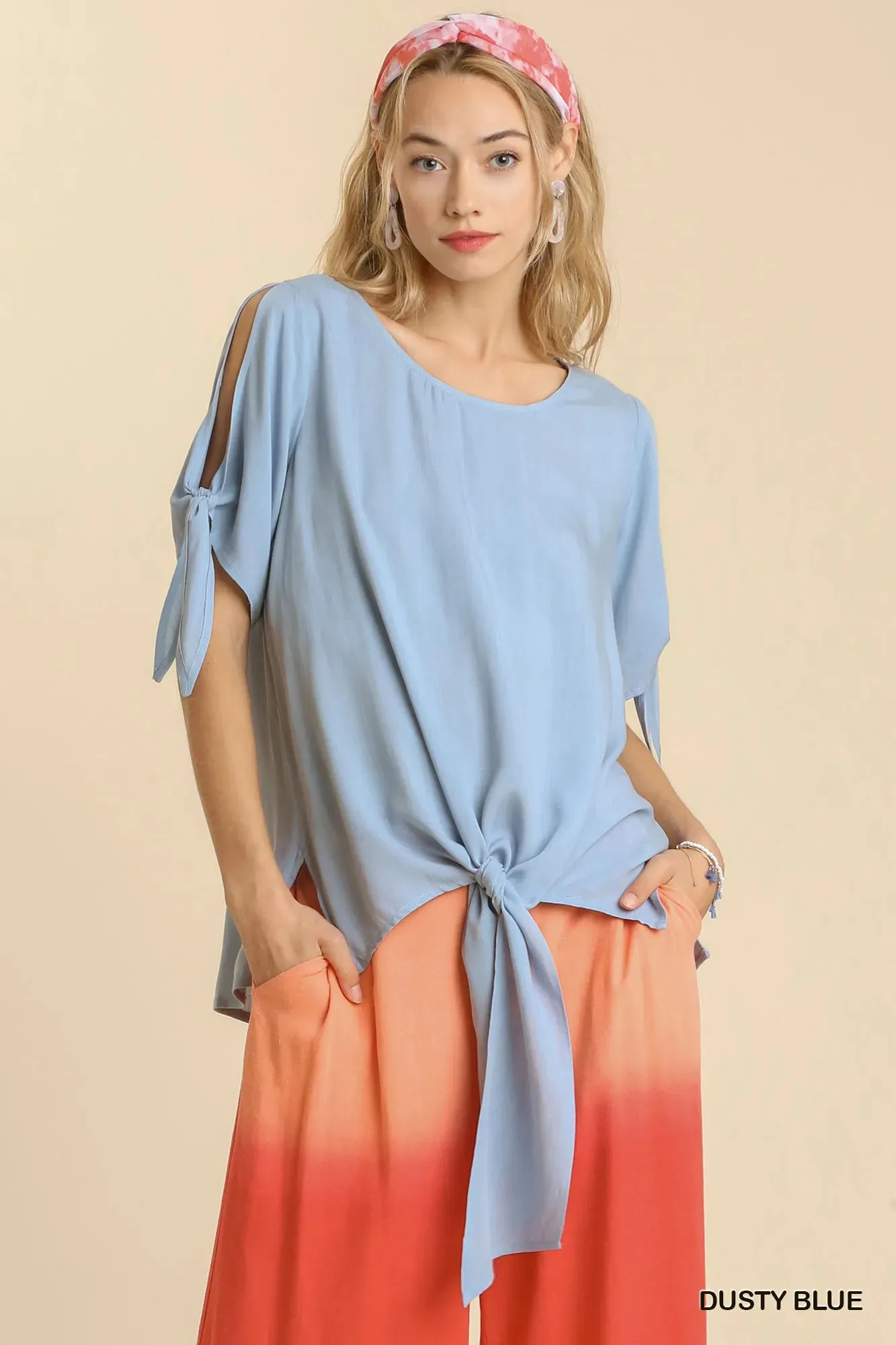 Umgee Cold Shoulder Short Sleeve Round Neck Top with Side Slits and Tie-able Knot Details sold by Charming Charlie