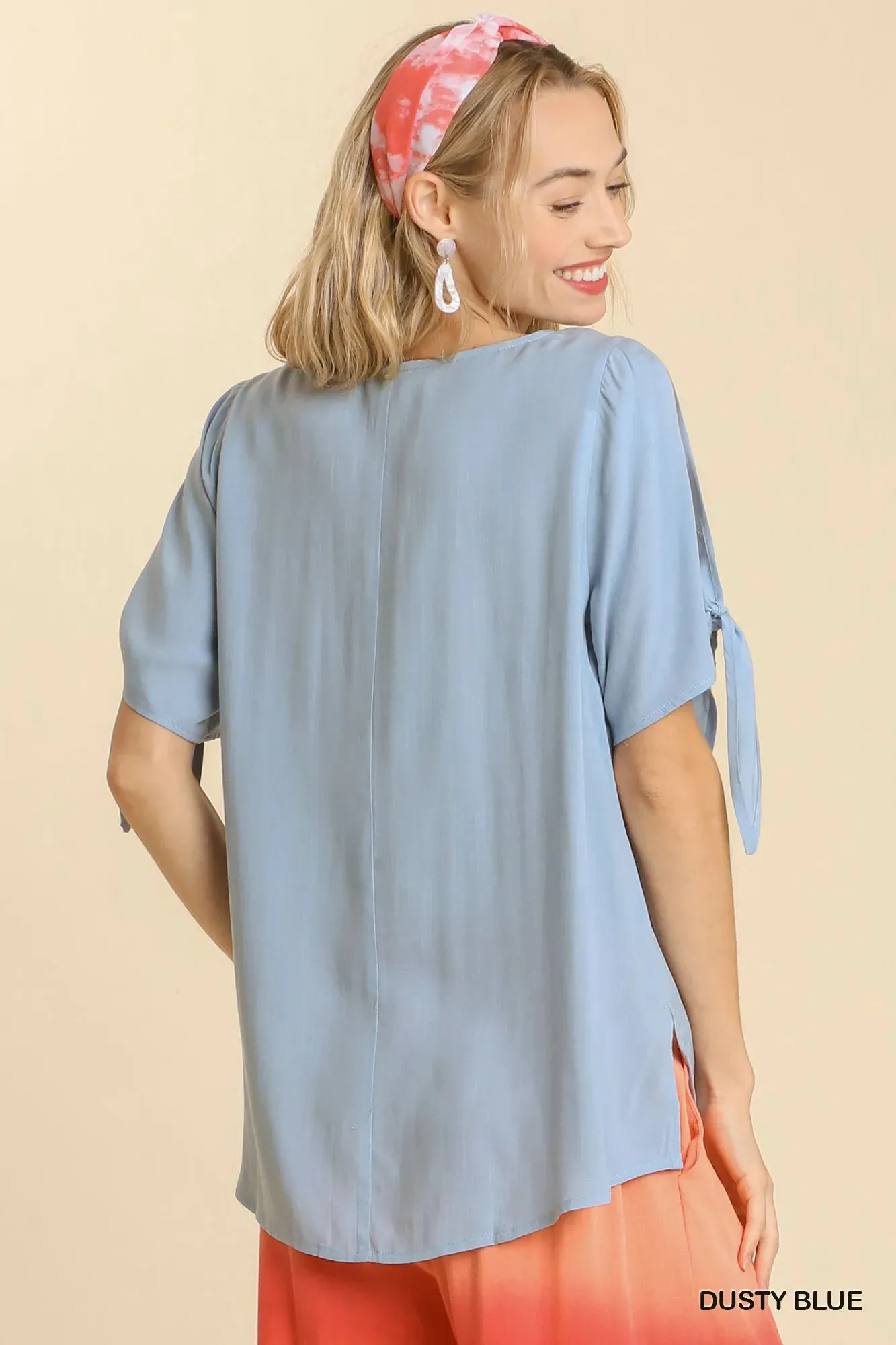 Umgee Cold Shoulder Short Sleeve Round Neck Top with Side Slits and Tie-able Knot Details sold by Charming Charlie product image thumbnail 2