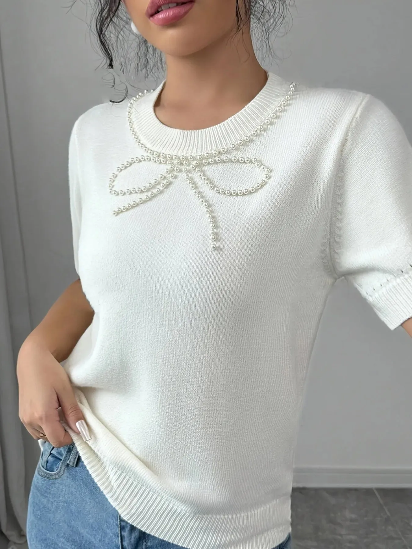 Pearl Bow Embellished Round Neck Sweater sold by Charming Charlie