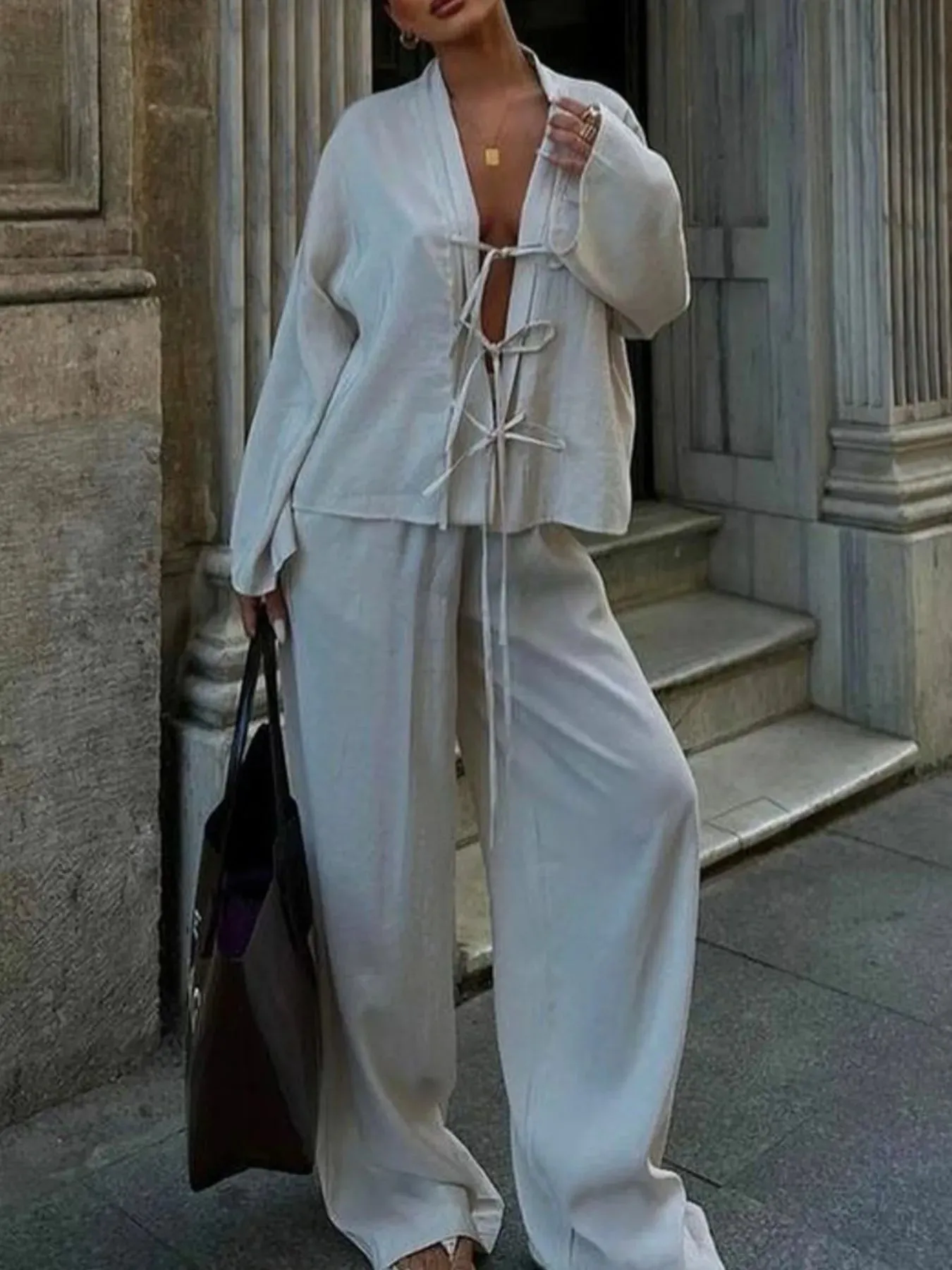 Tie Front Long Sleeve Top and Pants Set sold by Charming Charlie