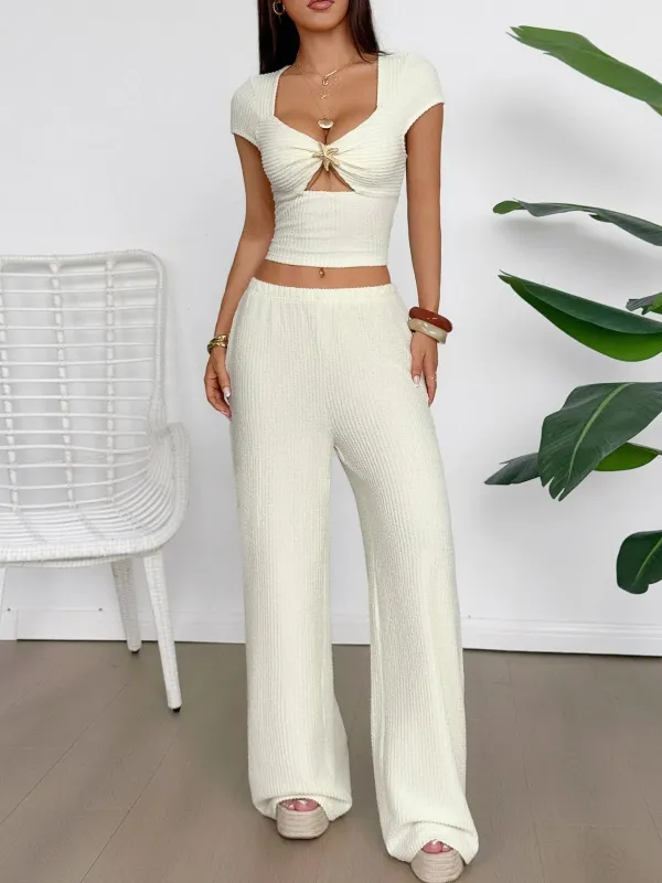 Cutout Short Sleeve Top and Pants Set sold by Charming Charlie