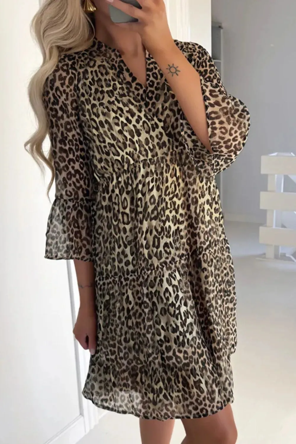 Leopard Print Relaxed Fit Notched Dress sold by Charming Charlie