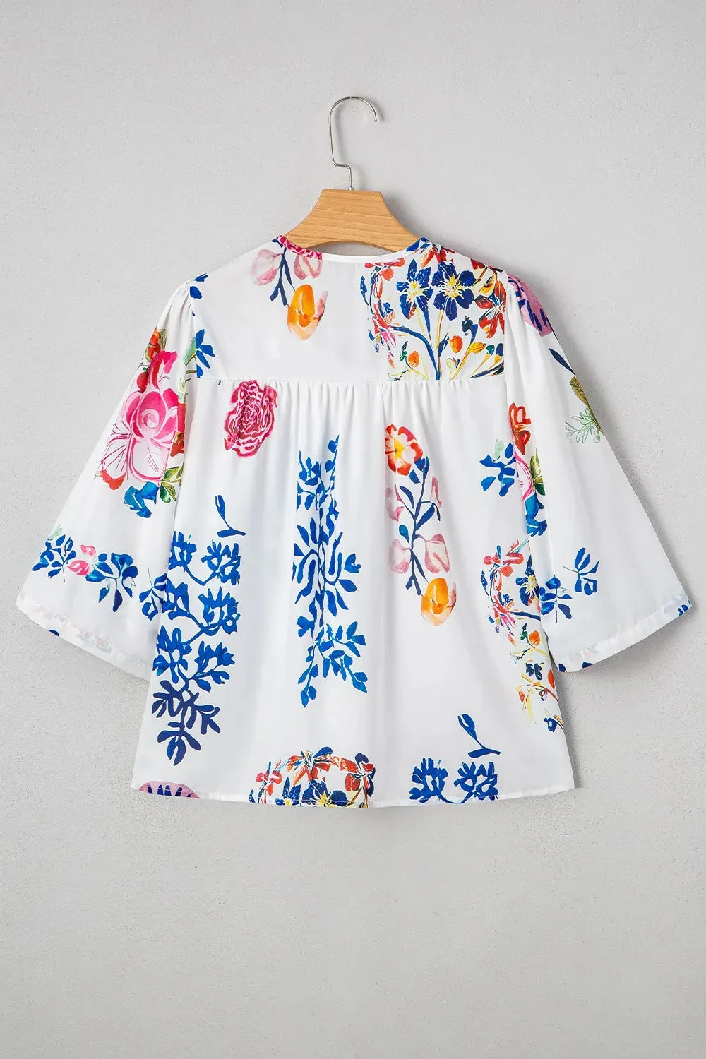 Printed Tie Neck 3/4 Sleeve Blouse sold by Charming Charlie product image thumbnail 3