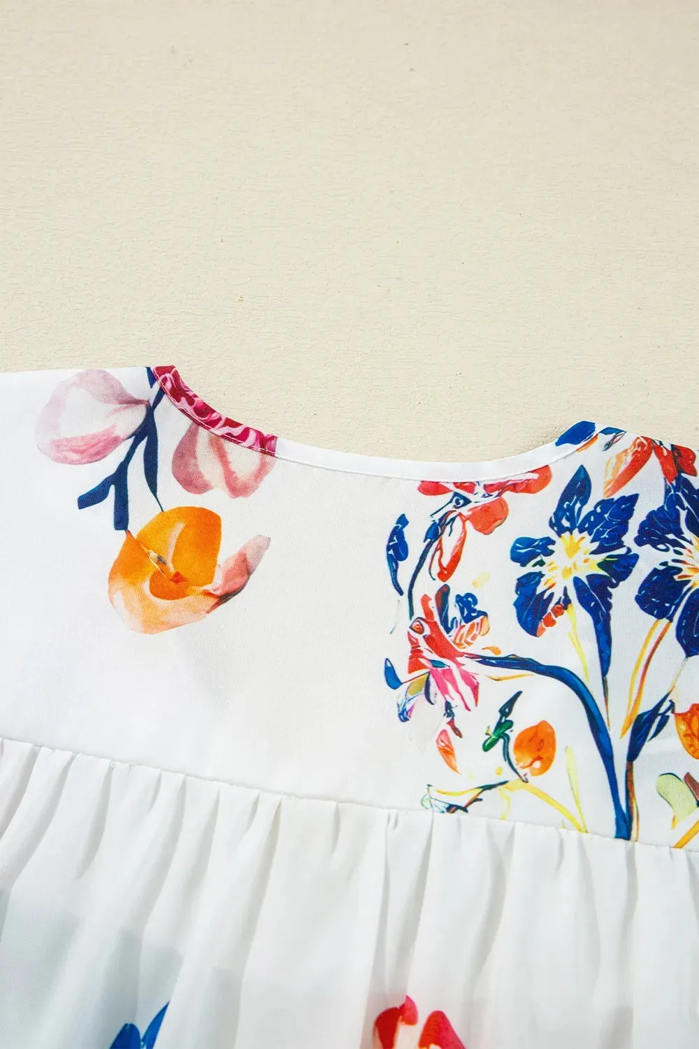 Printed Tie Neck 3/4 Sleeve Blouse sold by Charming Charlie product image thumbnail 5