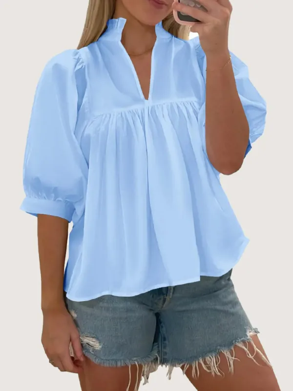 Notched Puff Sleeve Blouse sold by Charming Charlie