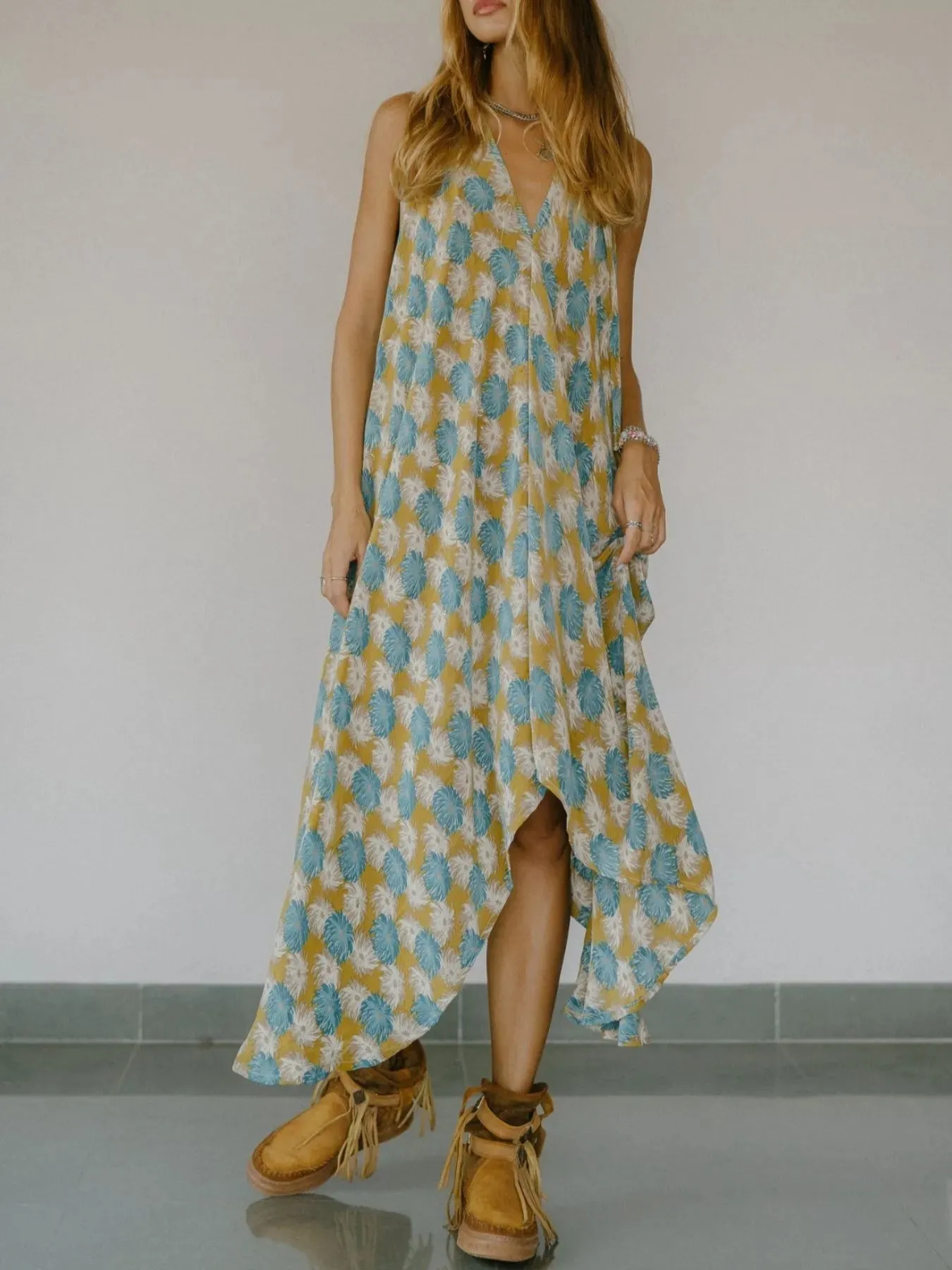 Asymmetrical Hem Printed Halter Neck Dress sold by Charming Charlie