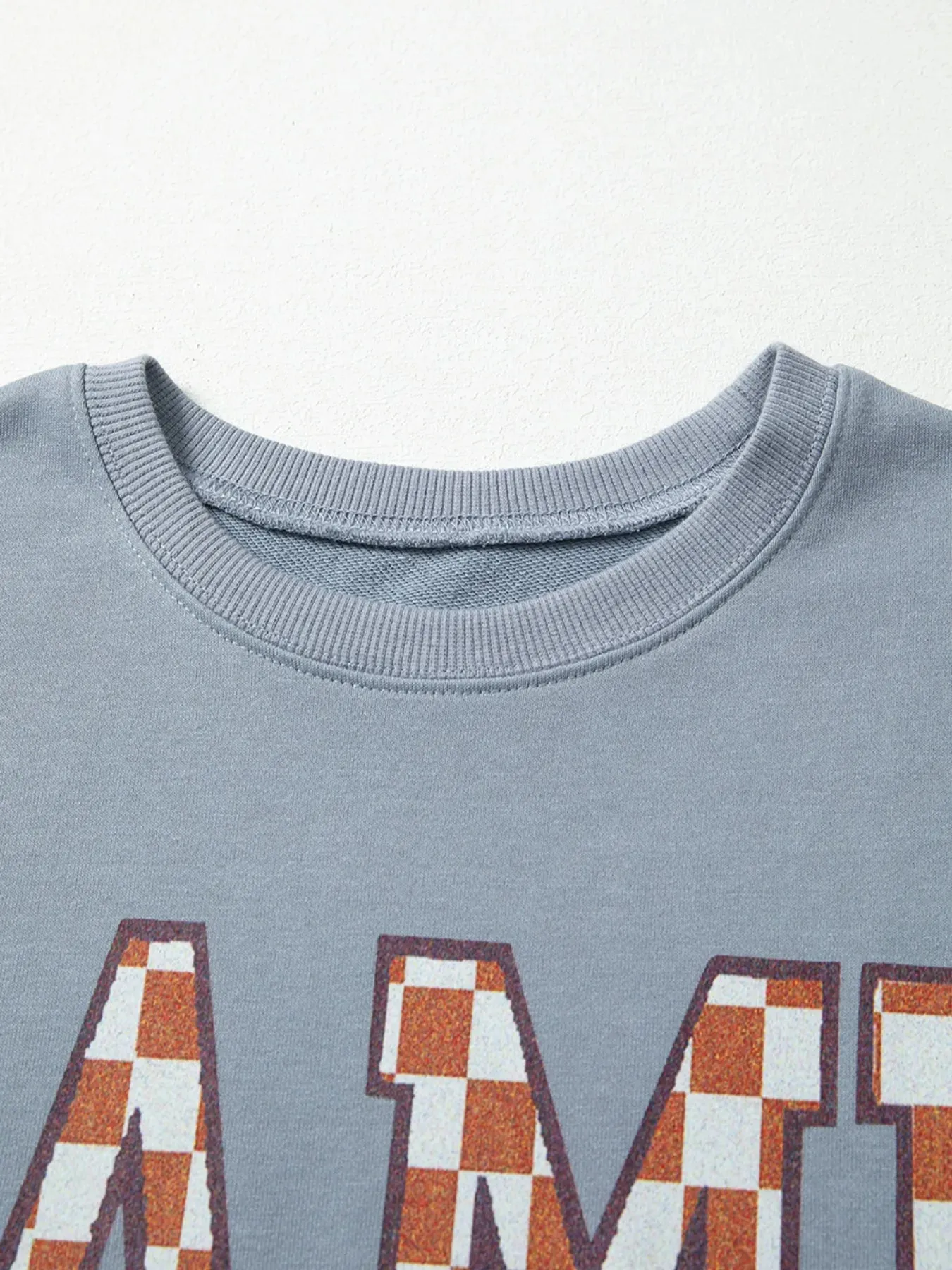 Game Day Checkered Oversized Sweatshirt sold by Charming Charlie product image thumbnail 4