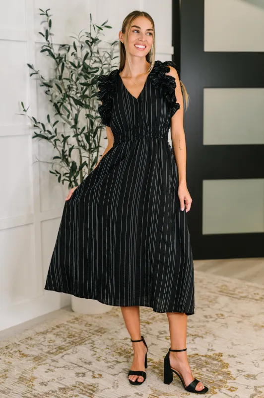 Pinstripe Romance V-Neck Ruffle Sleeve Dress in Black sold by Charming Charlie