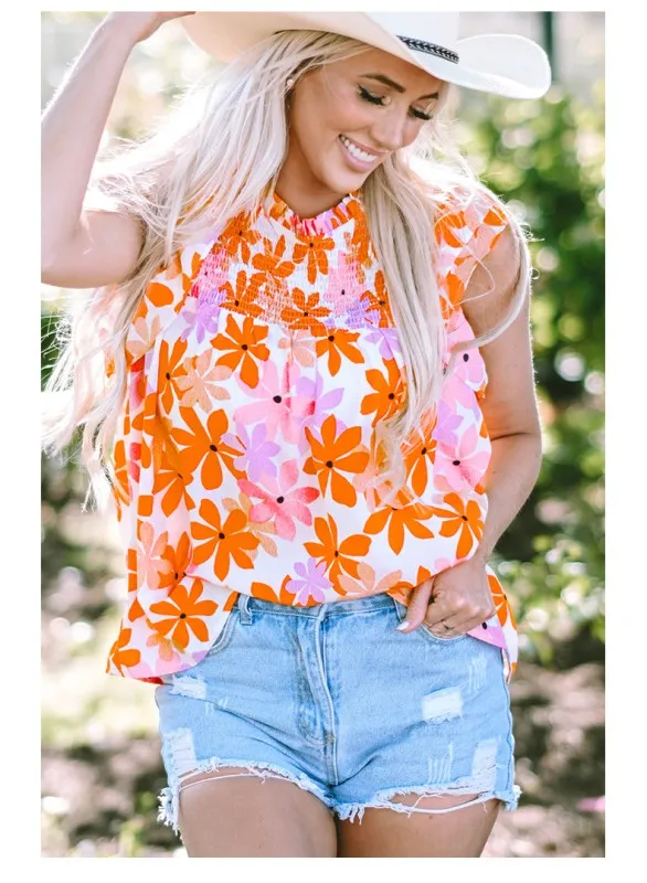 Orange Ruffled Sleeve Smocked Floral Top Blouse sold by Charming Charlie