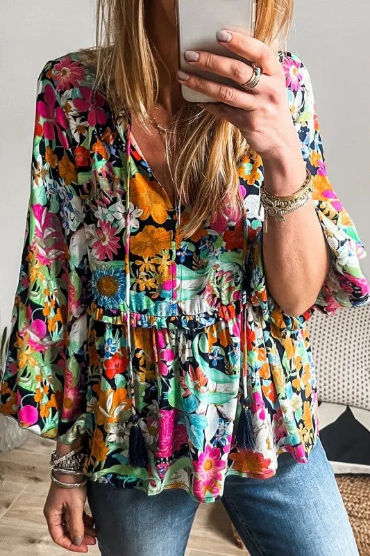 Floral Print Bubble Sleeve V Neck Ruffled Blouse sold by Charming Charlie