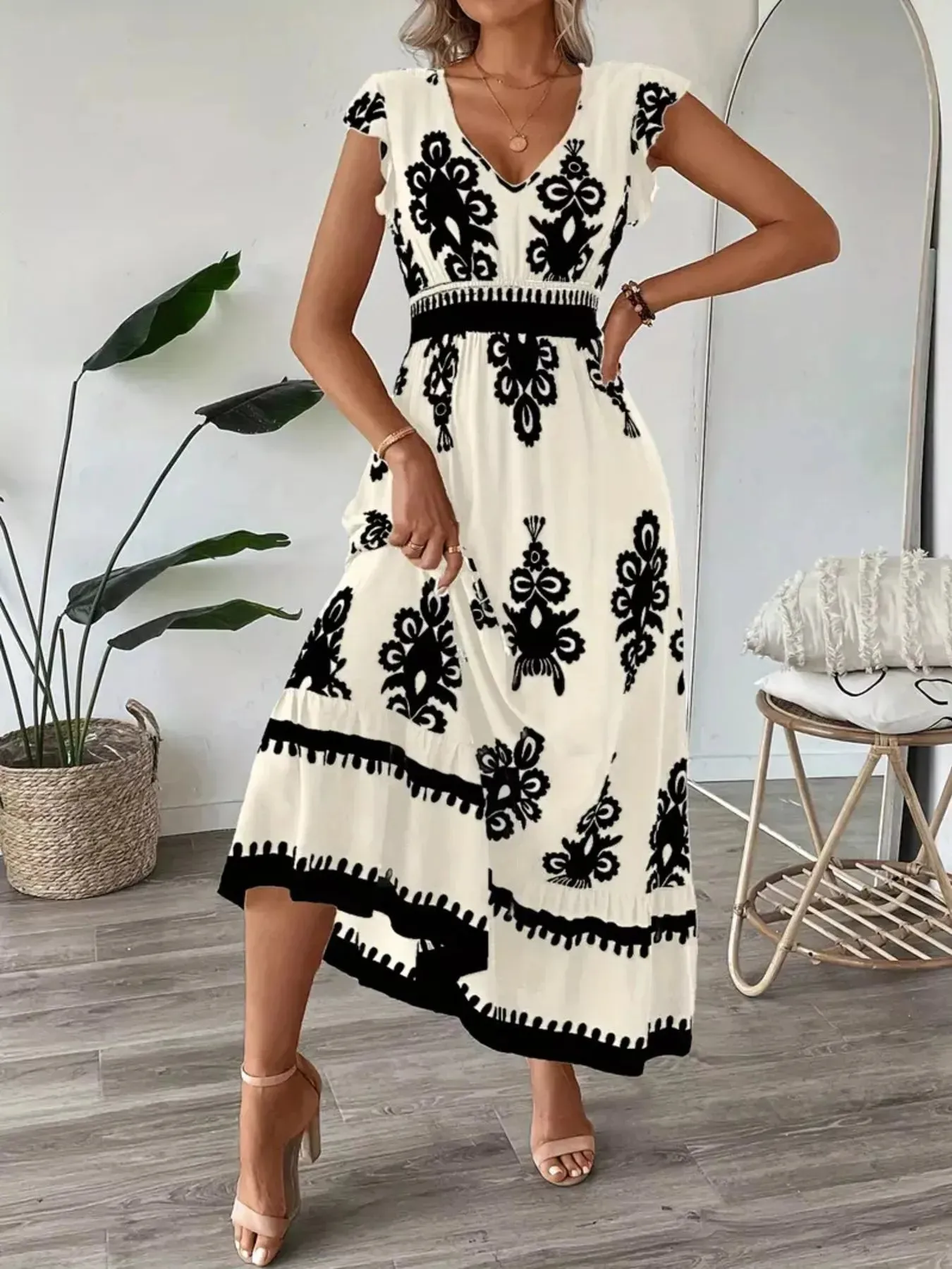 Printed V-Neck Ruffled Cap Sleeve Dress sold by Charming Charlie product image thumbnail 5