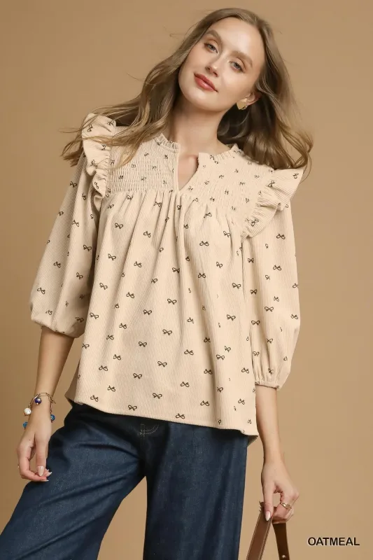 Umgee Bow Print Corduroy Puff Sleeve Blouse with Ruffled sold by Charming Charlie