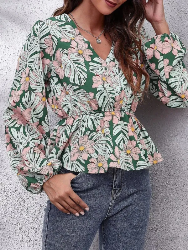Floral V-Neck Balloon Sleeve Blouse sold by Charming Charlie