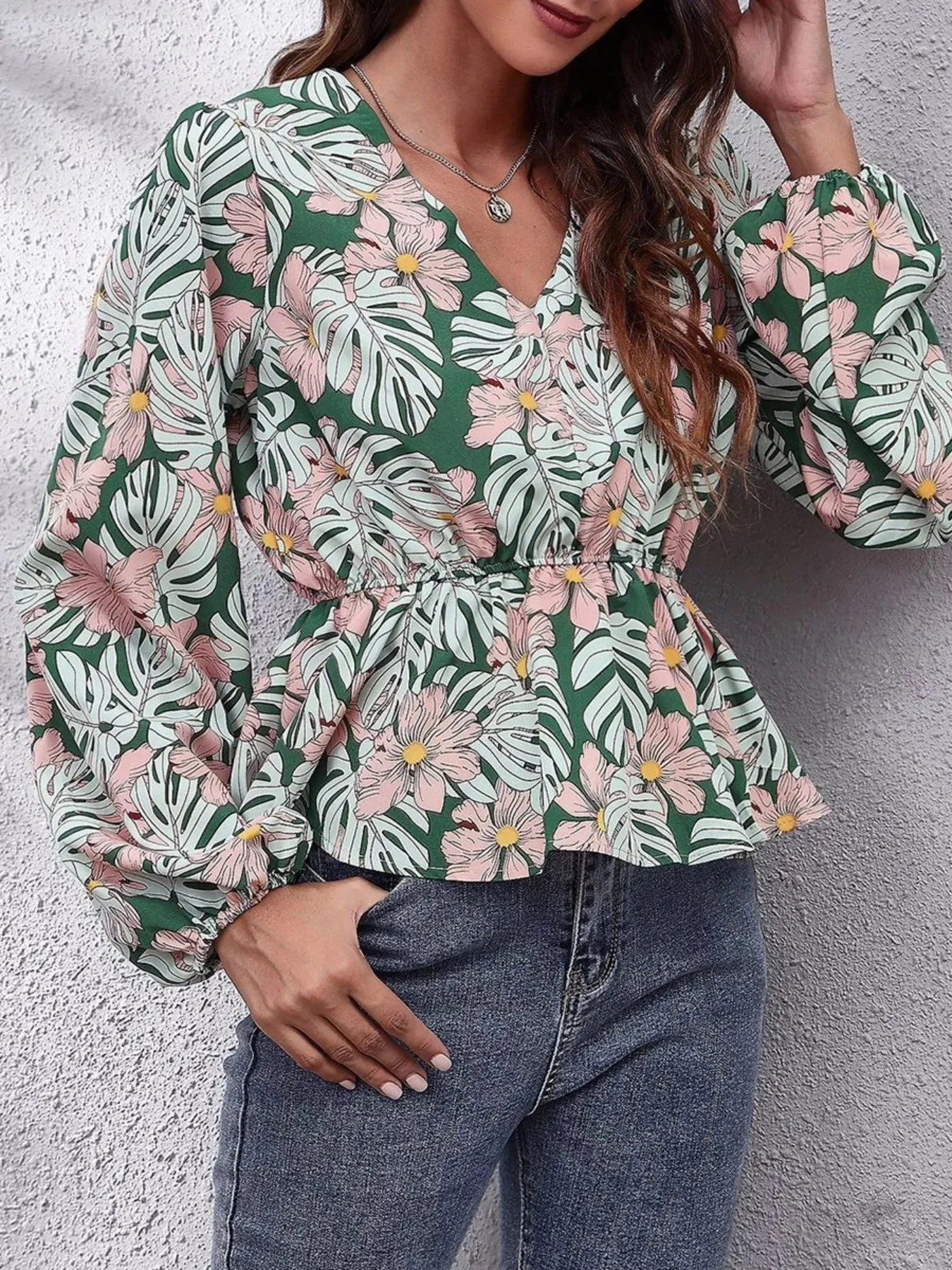 Floral V-Neck Balloon Sleeve Blouse sold by Charming Charlie