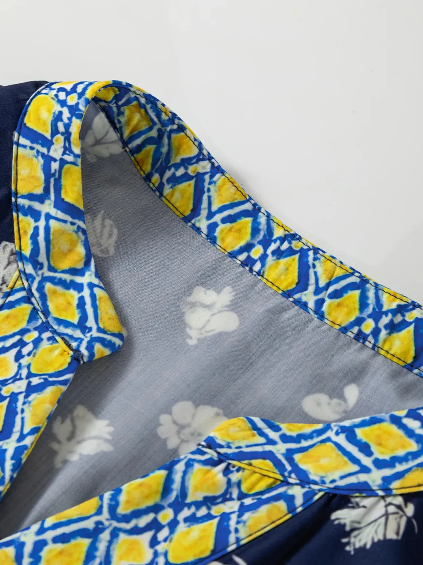 Floral Print Half Sleeve Contrast Trim Blouse sold by Charming Charlie product image thumbnail 4