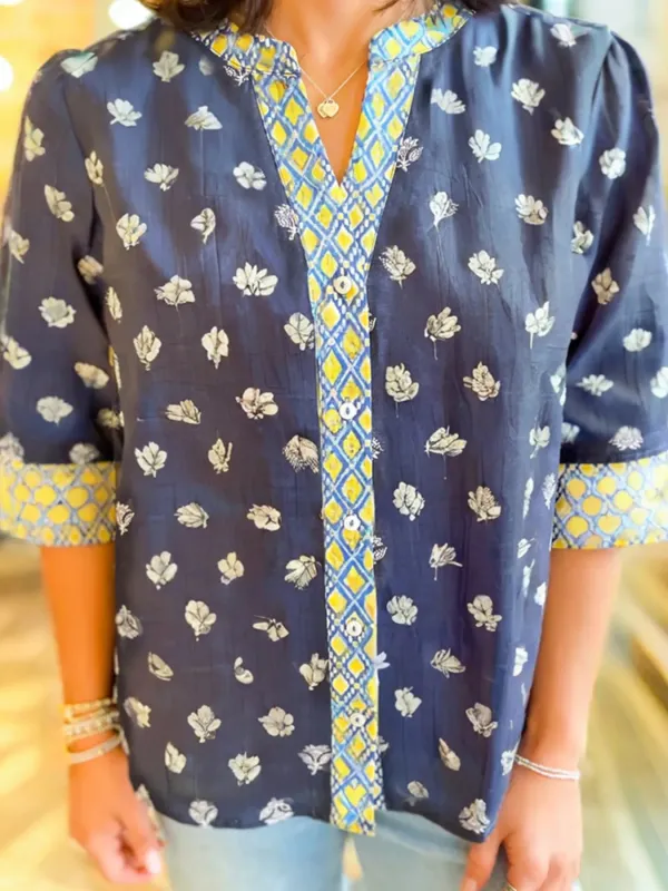 Floral Print Half Sleeve Contrast Trim Blouse sold by Charming Charlie