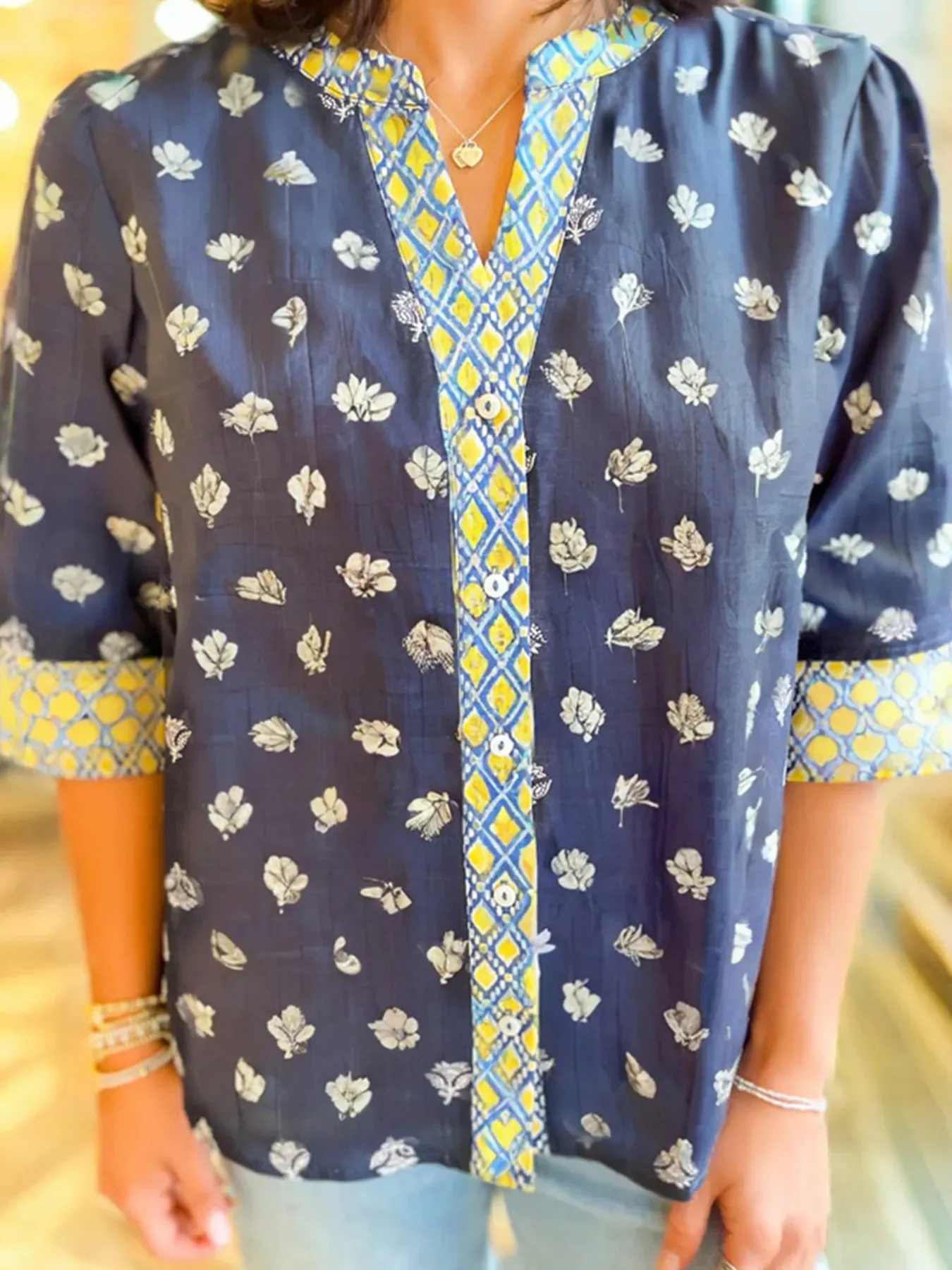 Floral Print Half Sleeve Contrast Trim Blouse sold by Charming Charlie