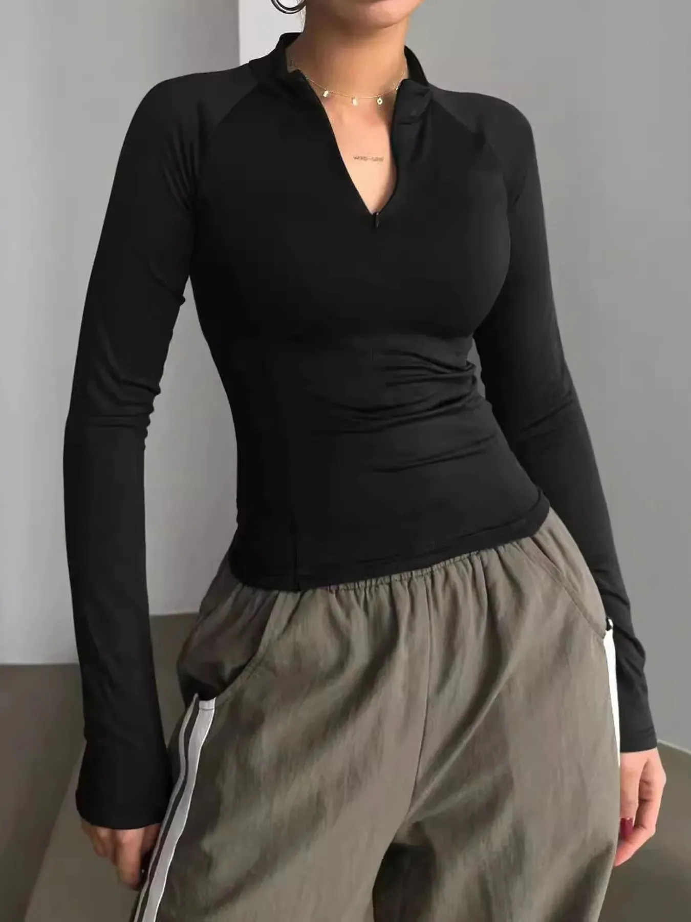 Long Sleeve Zip Front Fitted T-Shirt sold by Charming Charlie product image thumbnail 4