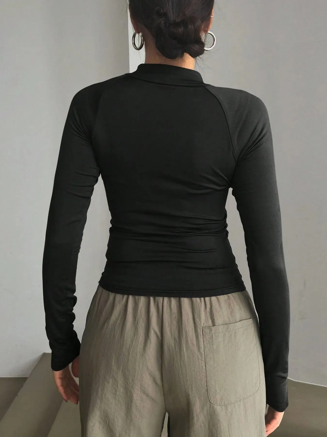 Long Sleeve Zip Front Fitted T-Shirt sold by Charming Charlie product image thumbnail 5