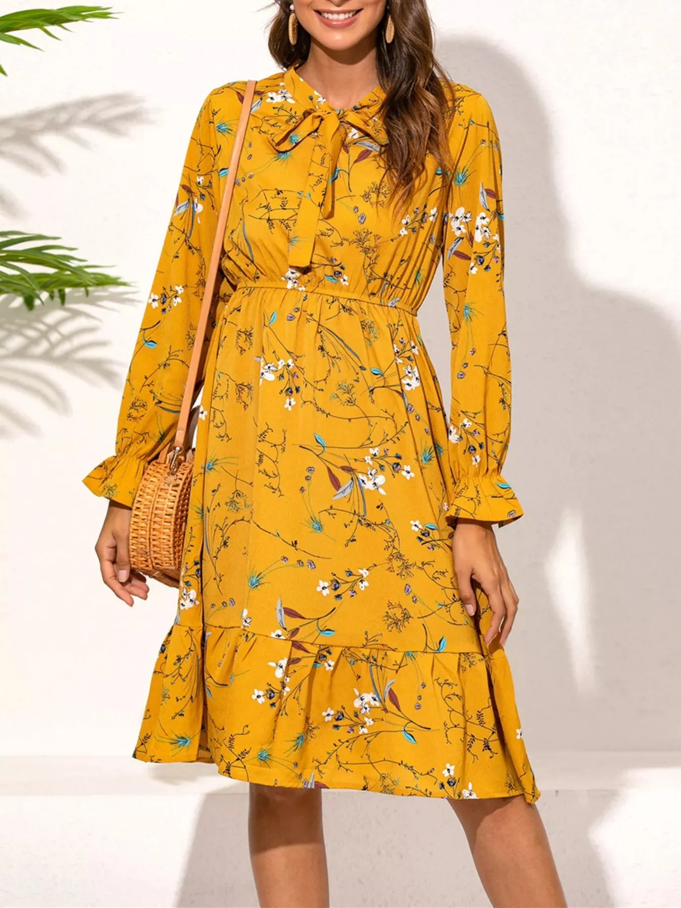 Ruffled Hem Floral Print Long Sleeve Dress sold by Charming Charlie