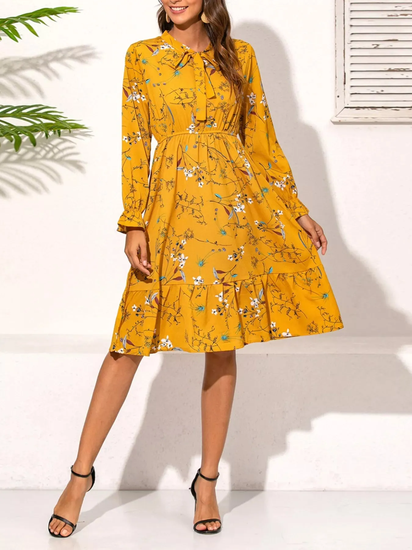 Ruffled Hem Floral Print Long Sleeve Dress sold by Charming Charlie product image thumbnail 3