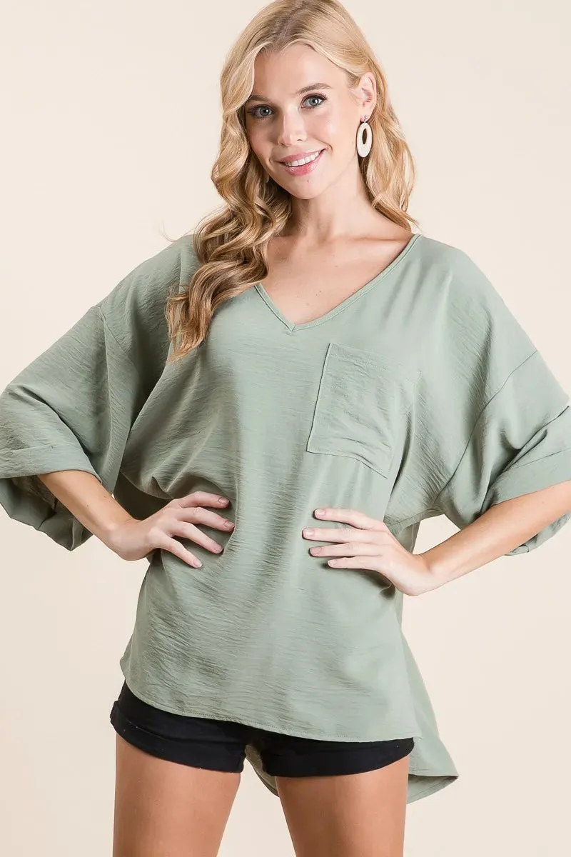 BiBi Flowy Woven V-Neck Top with Rolled Up Cuffs sold by Charming Charlie product image thumbnail 2