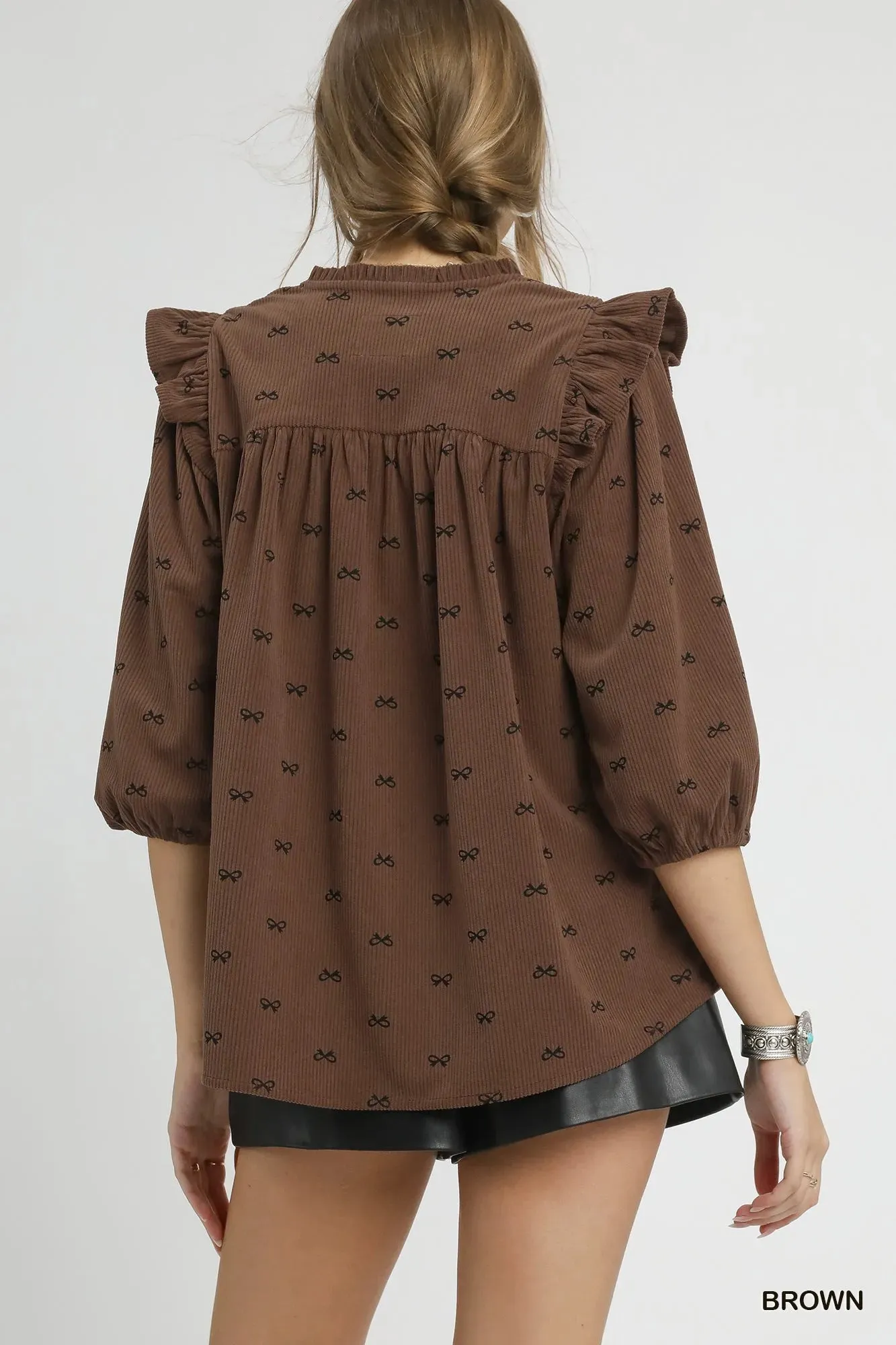 Umgee Bow Print Corduroy Puff Sleeve Blouse with Ruffled sold by Charming Charlie product image thumbnail 2