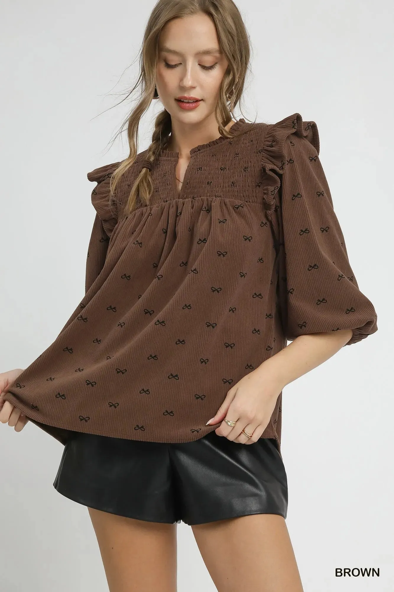 Umgee Bow Print Corduroy Puff Sleeve Blouse with Ruffled sold by Charming Charlie product image thumbnail 3