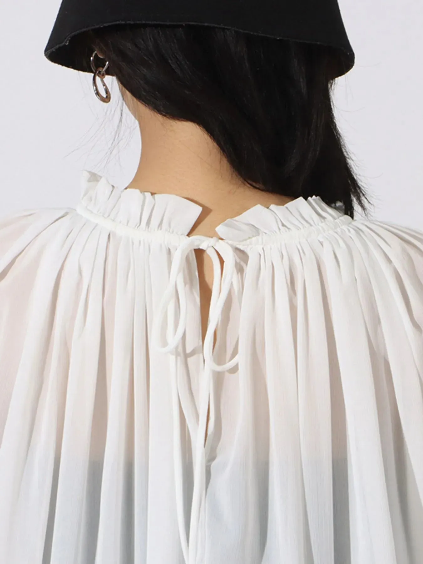 Ruffled Hem Long Sleeve Blouse sold by Charming Charlie product image thumbnail 4