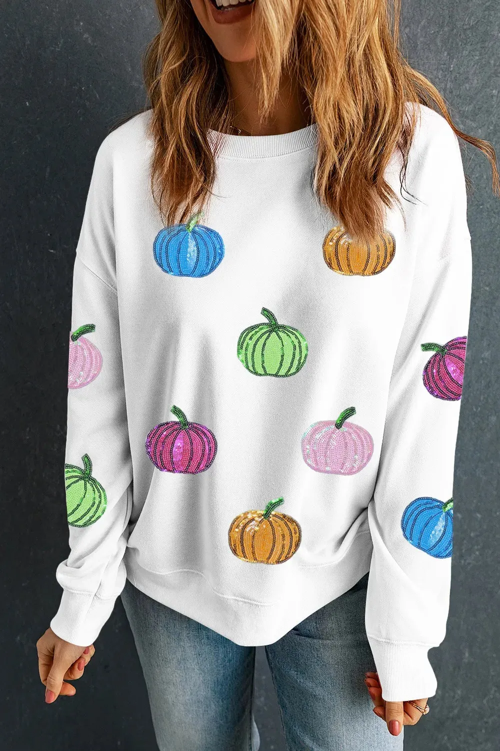Pumpkin Round Neck Long Sleeve Sweatshirt sold by Charming Charlie