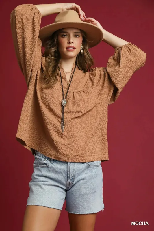 Umgee Textured Notched Blouse with Balloon Sleeves sold by Charming Charlie