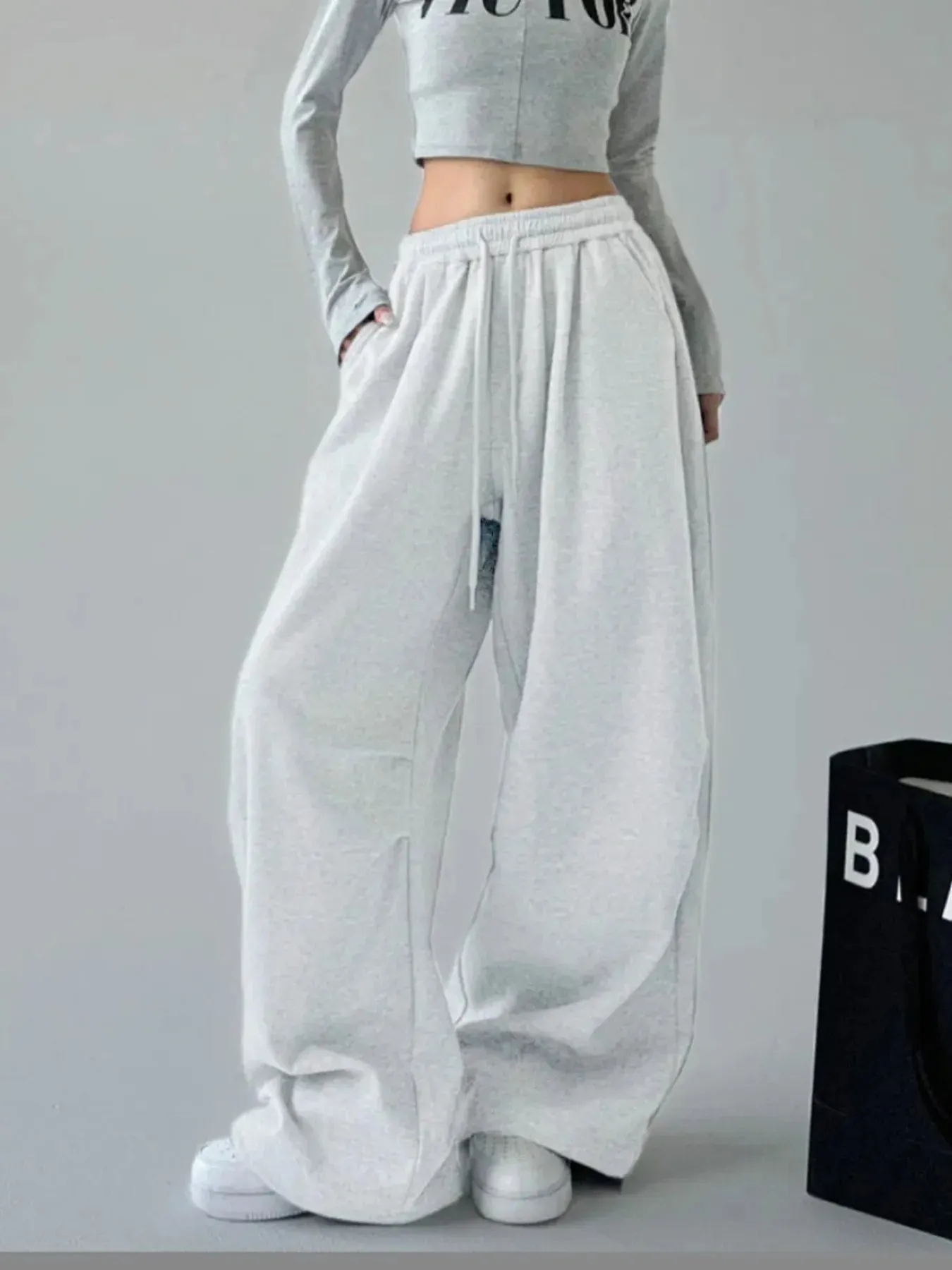 Oversized Wide Leg Drawstring Pants sold by Charming Charlie