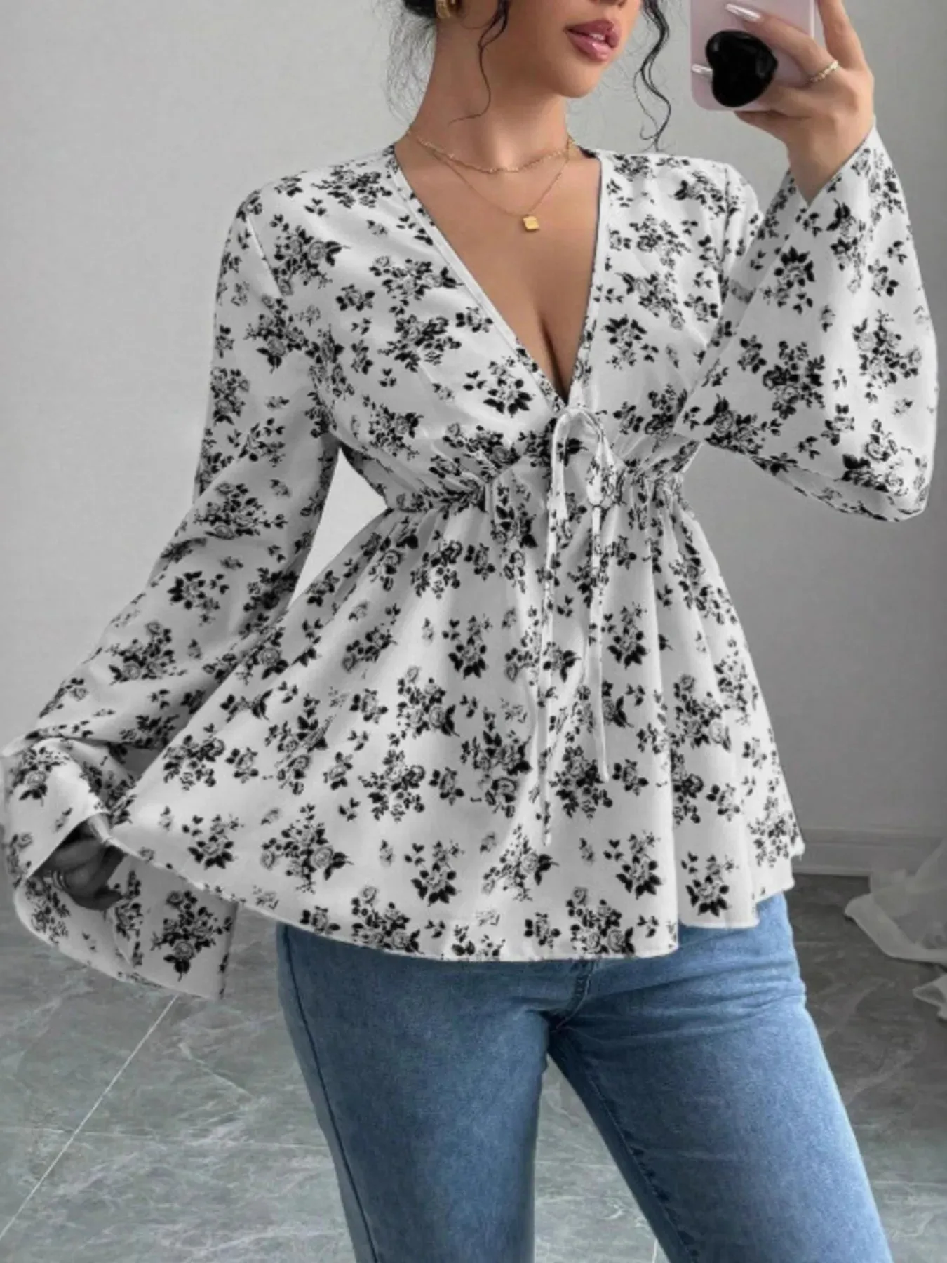 Floral Print V-Neck Long Sleeve Blouse sold by Charming Charlie