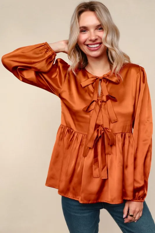 Tied Up in Style Rust Ribbon Blouse sold by Charming Charlie