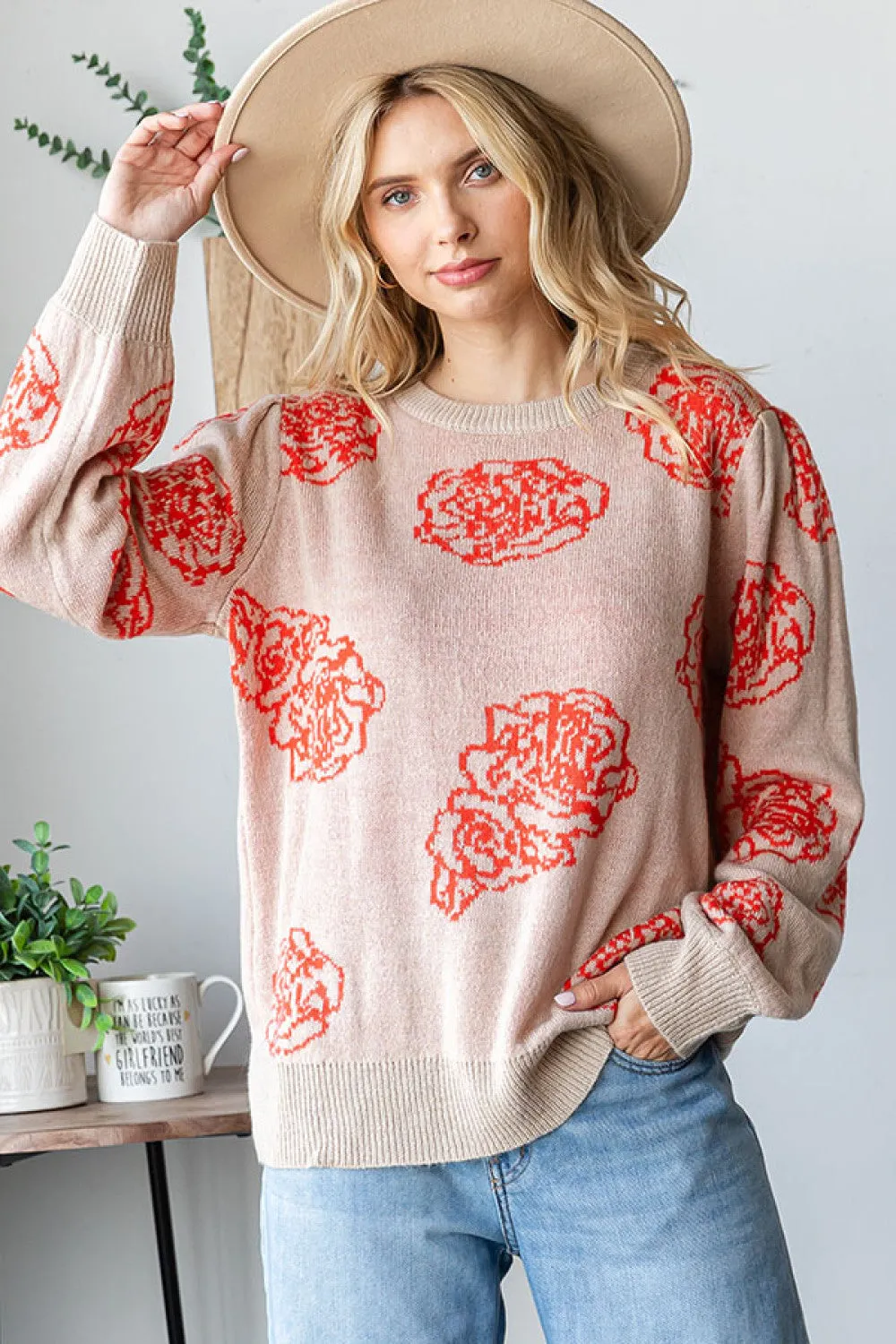 One Wild Rose Coral Cozy Sweater sold by Charming Charlie