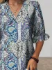 Full Size Bohemian Paisley Print V-Neck Midi Dress Plus Size sold by Charming Charlie