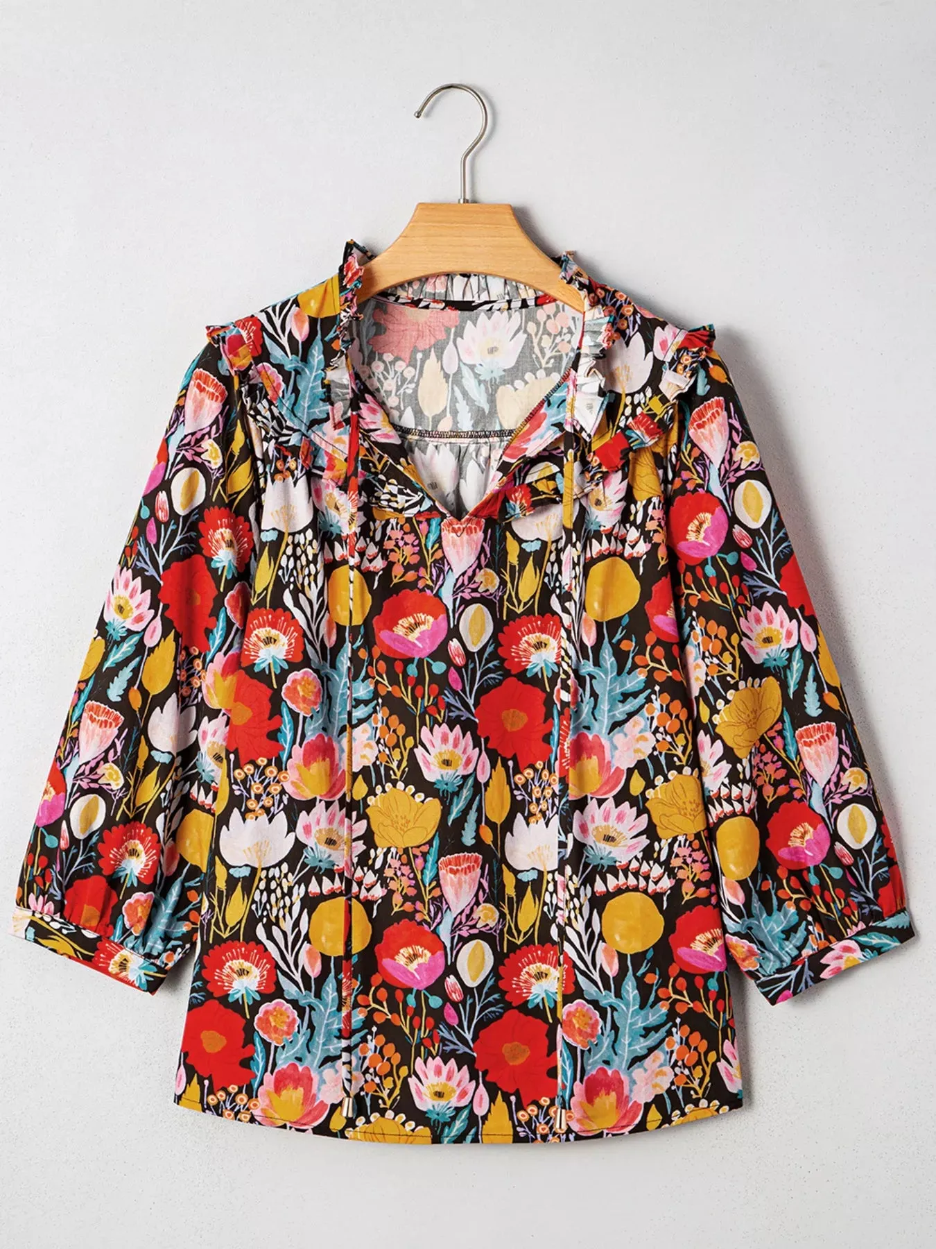 Floral 3/4 Puff Sleeve Tied Neck Blouse sold by Charming Charlie product image thumbnail 3